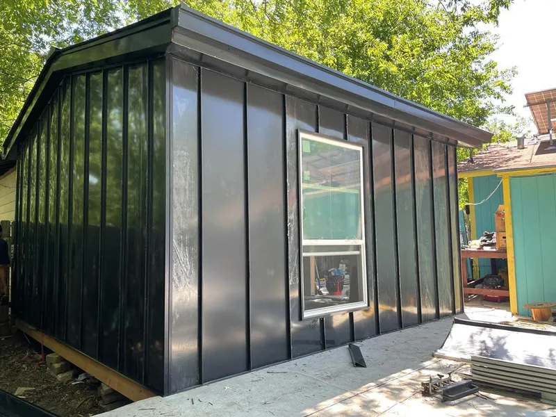 Black standing seam metal wall panels for Roof Inspection in Stevensville