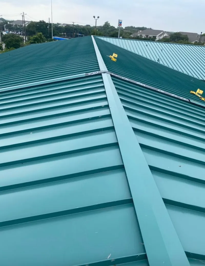 Green commercial metal roof ridge and valley for Metal Roof Repair in Stevensville